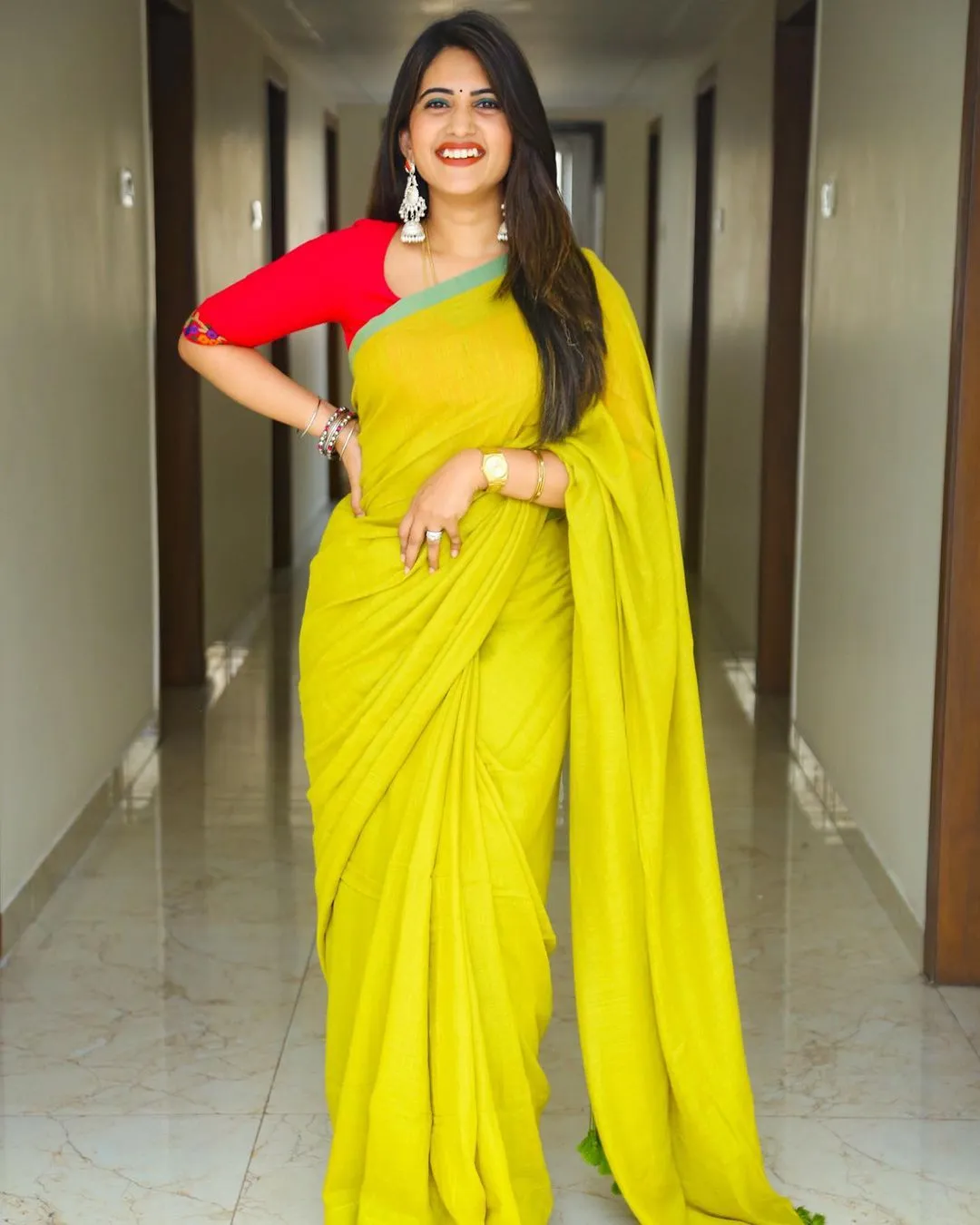 TELUGU TV ANCHOR SRAVANTHI CHOKARAPU STILLS IN YELLOW SAREE RED BLOUSE 8